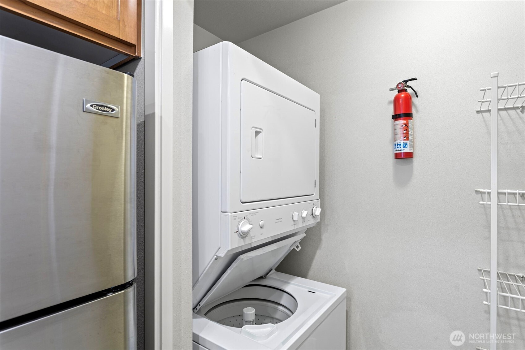 2801 1st Avenue, Unit 612 Seattle, WA 98121 - Photo 13 of 27 a bathroom with a toilet and a wooden floor