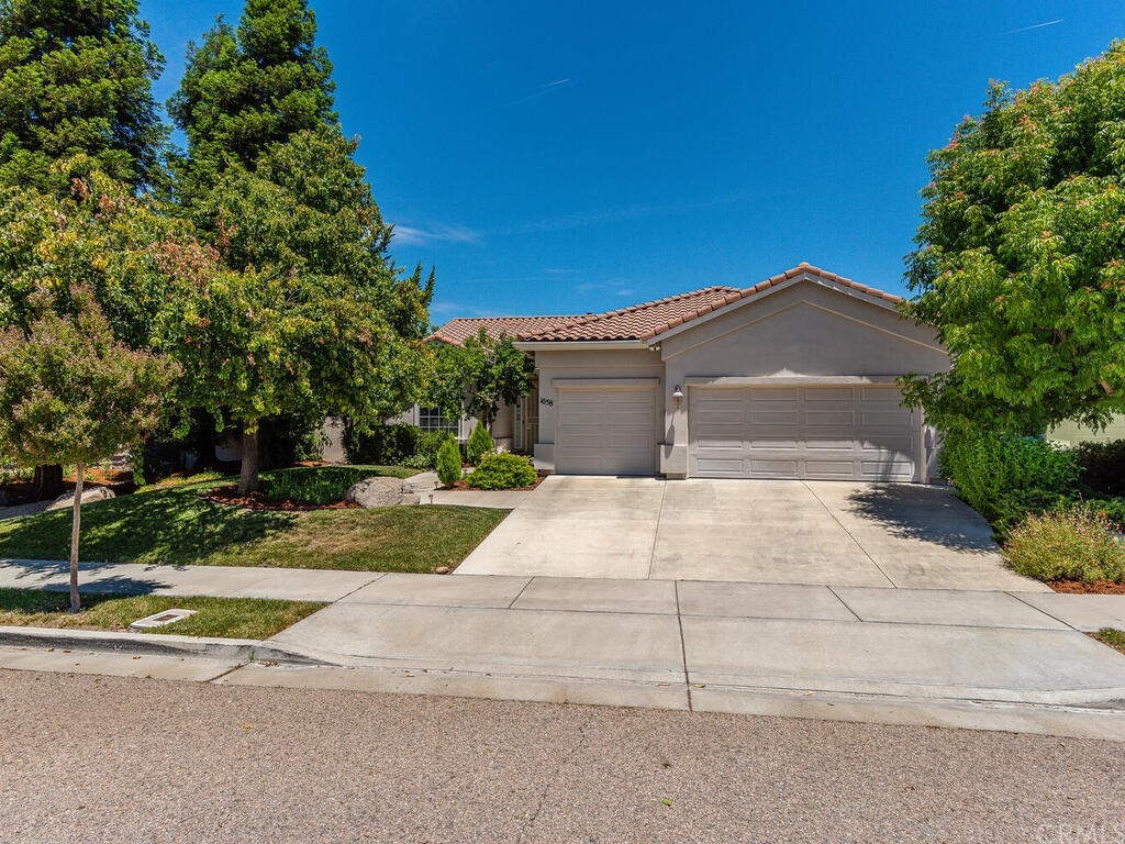 1058 Sleepy Hollow Road Paso Robles, CA 93446 - Photo 1 of 1 a front view of a house with a yard and garage