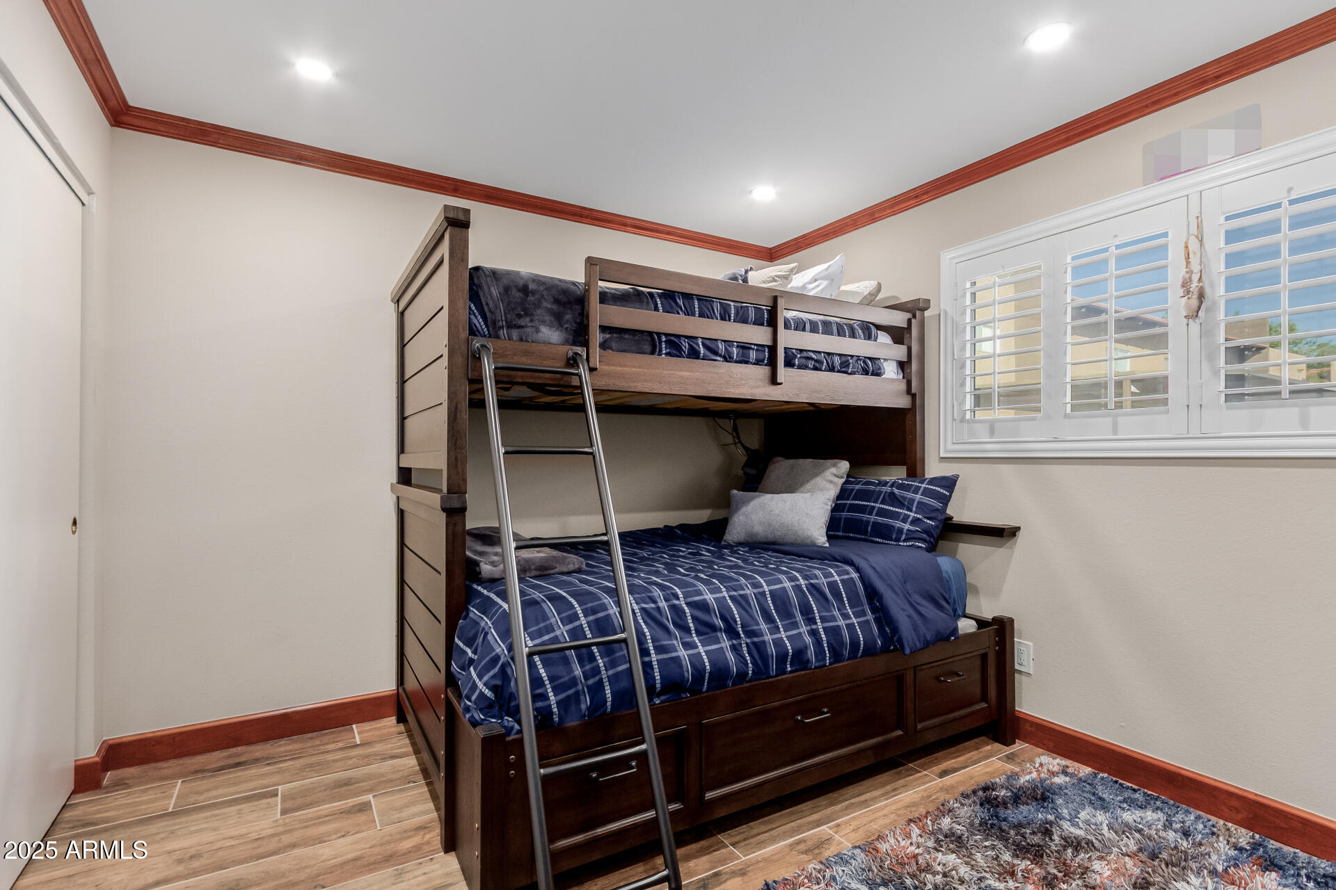 5525 East Thomas Road, Unit E3 Phoenix, AZ 85018 - Photo 21 of 34 a bedroom with a bed and a window