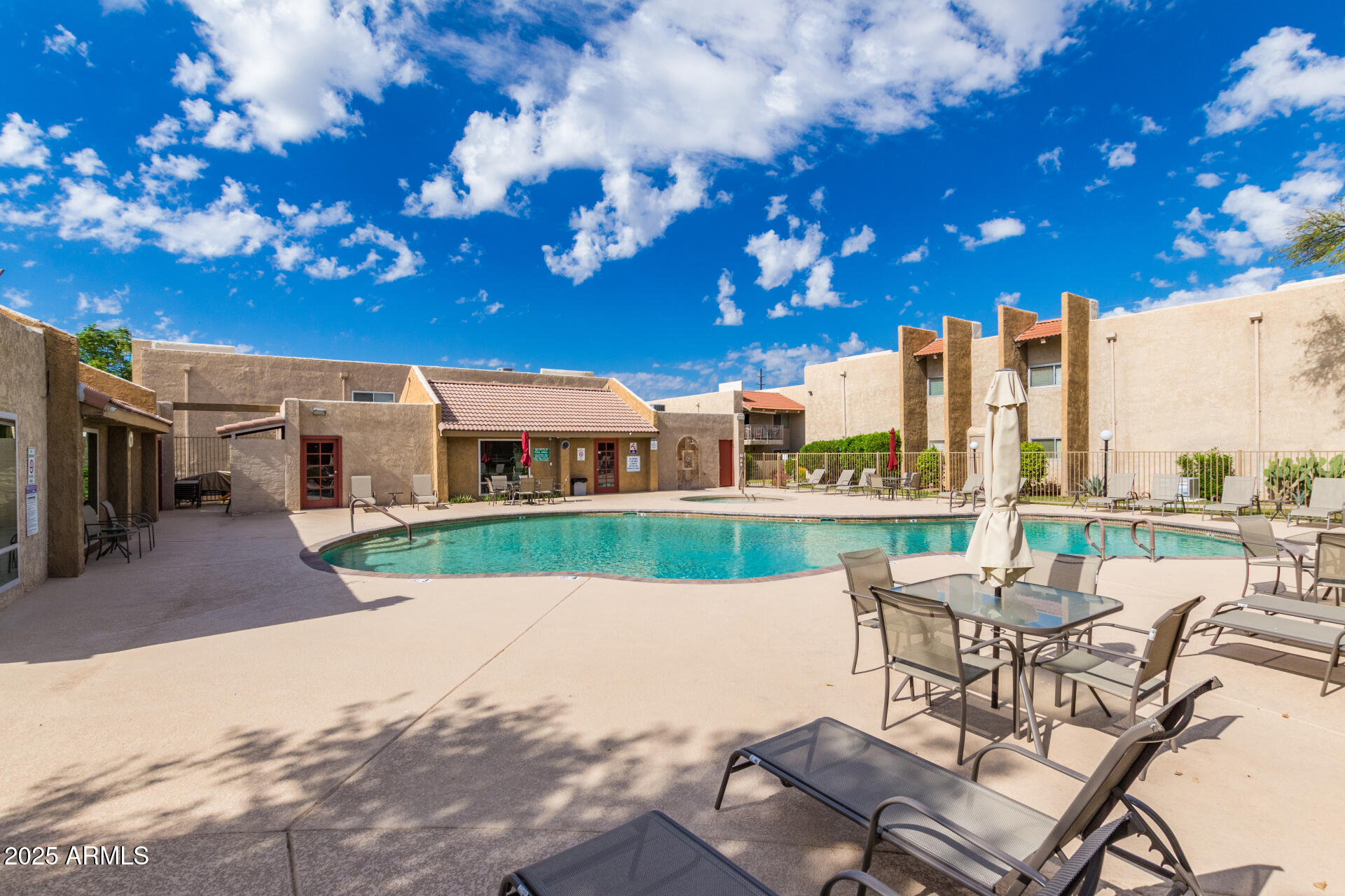 5525 East Thomas Road, Unit E3 Phoenix, AZ 85018 - Photo 34 of 34 a view of a patio with couches and table