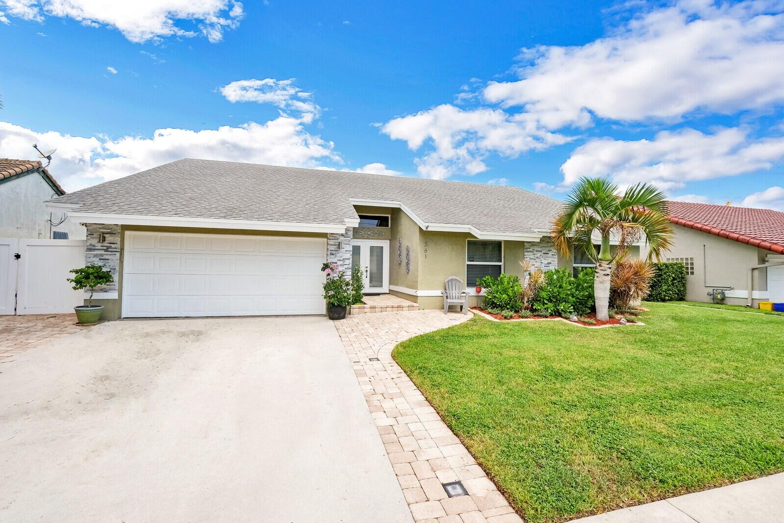 261 North Country Club Boulevard Boca Raton, FL 33487 - Photo 1 of 46 02_Image_2_mls (2)