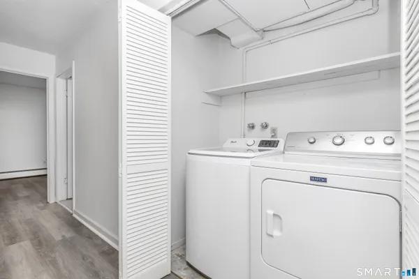 a utility room with dryer and washer