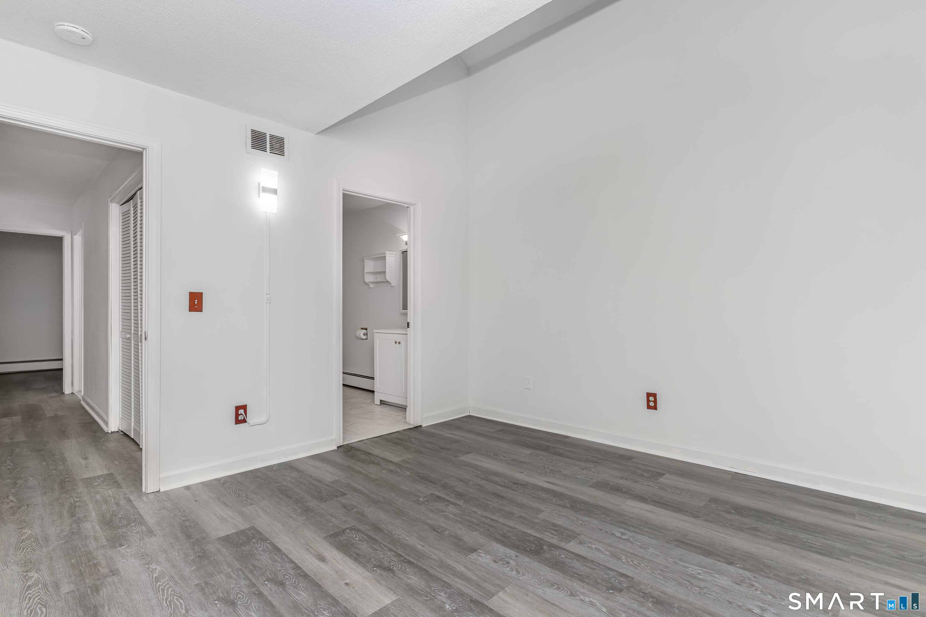 5 Talcott Forest Road, Unit A Farmington, CT 06032 - Photo 16 of 36 a view of a room with wooden floor