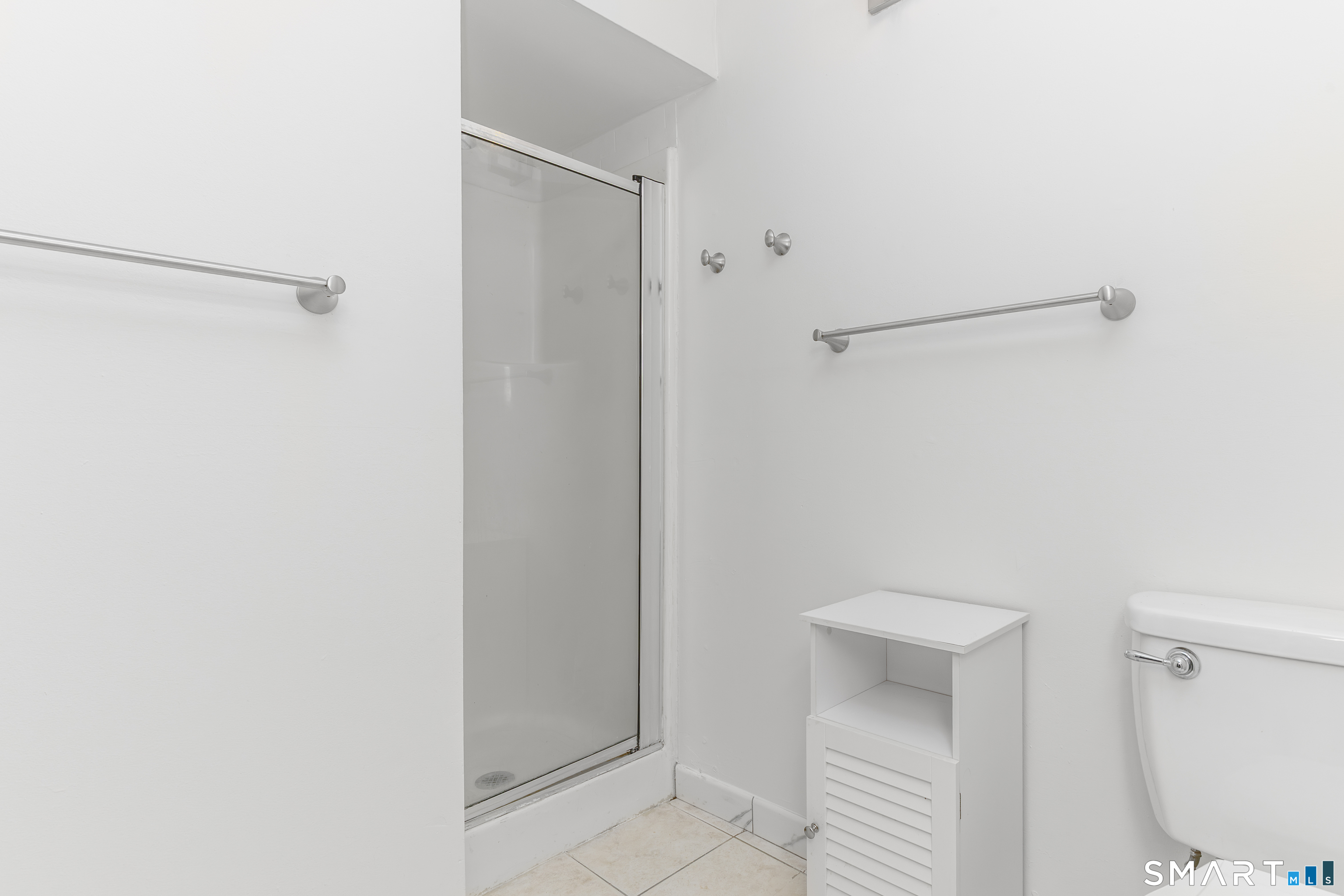 5 Talcott Forest Road, Unit A Farmington, CT 06032 - Photo 18 of 36 a bathroom with a shower and toilet