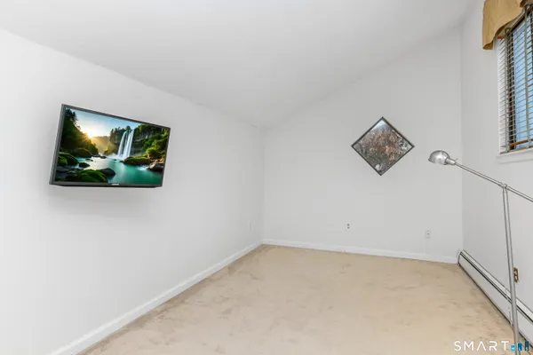 a view of a room with a washer and dryer