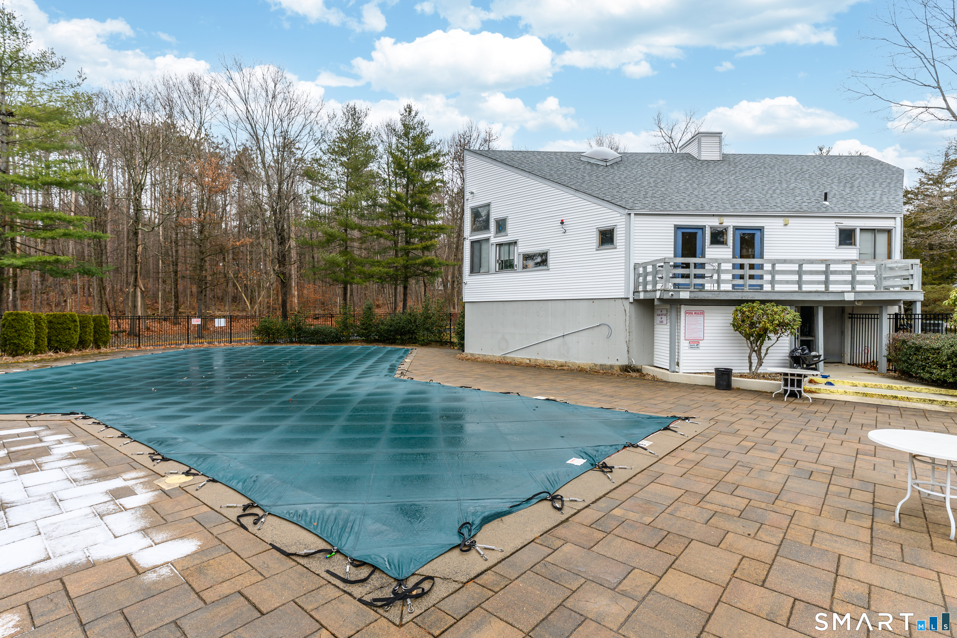 5 Talcott Forest Road, Unit A Farmington, CT 06032 - Photo 30 of 36 a view of a terrace with a swimming pool
