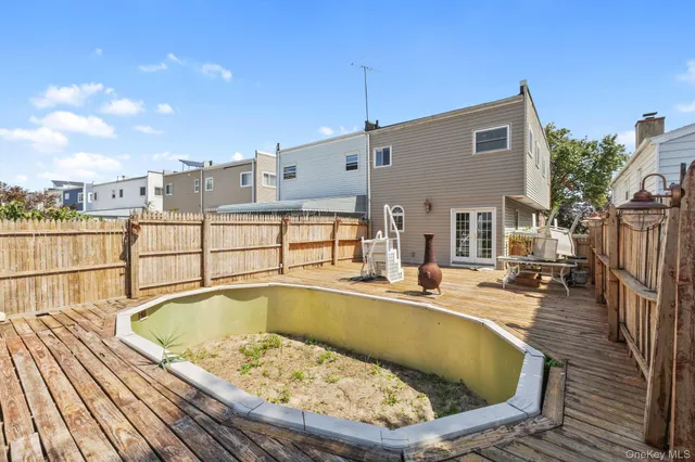 a view of balcony and deck with outdoor seating