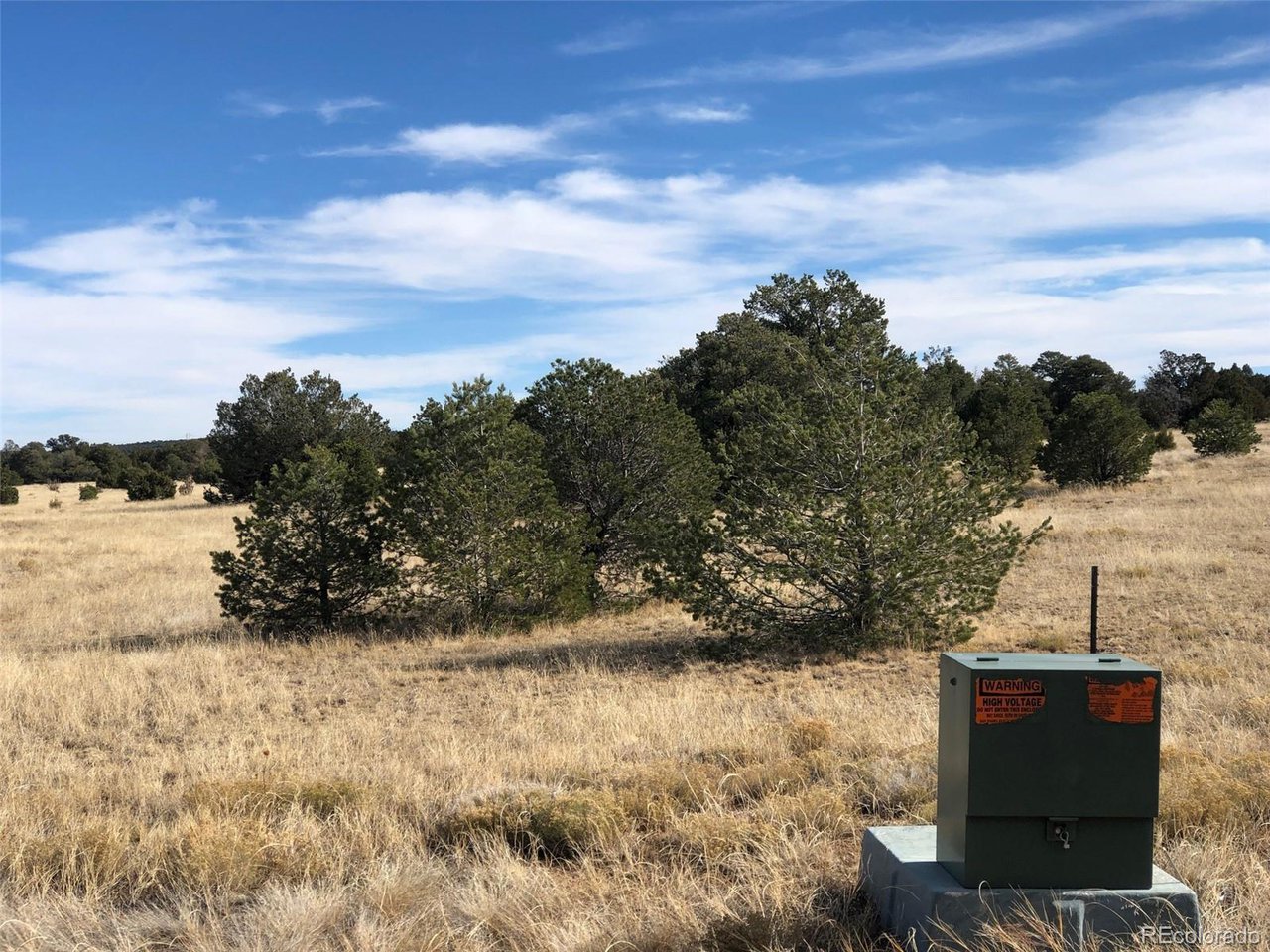 23 River Ridge Ranch Walsenburg, CO 81089 - Photo 3 of 19 a view of a yard with wooden fence