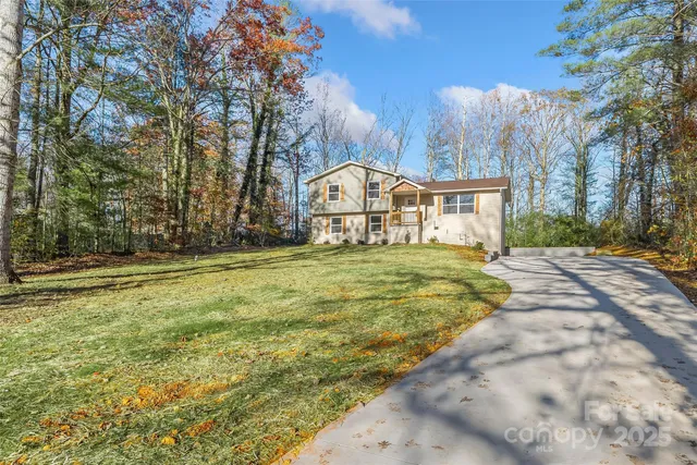 a view of empty room with windows