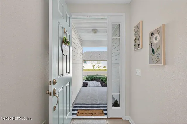 a bathroom with a sink a mirror and a bathtub