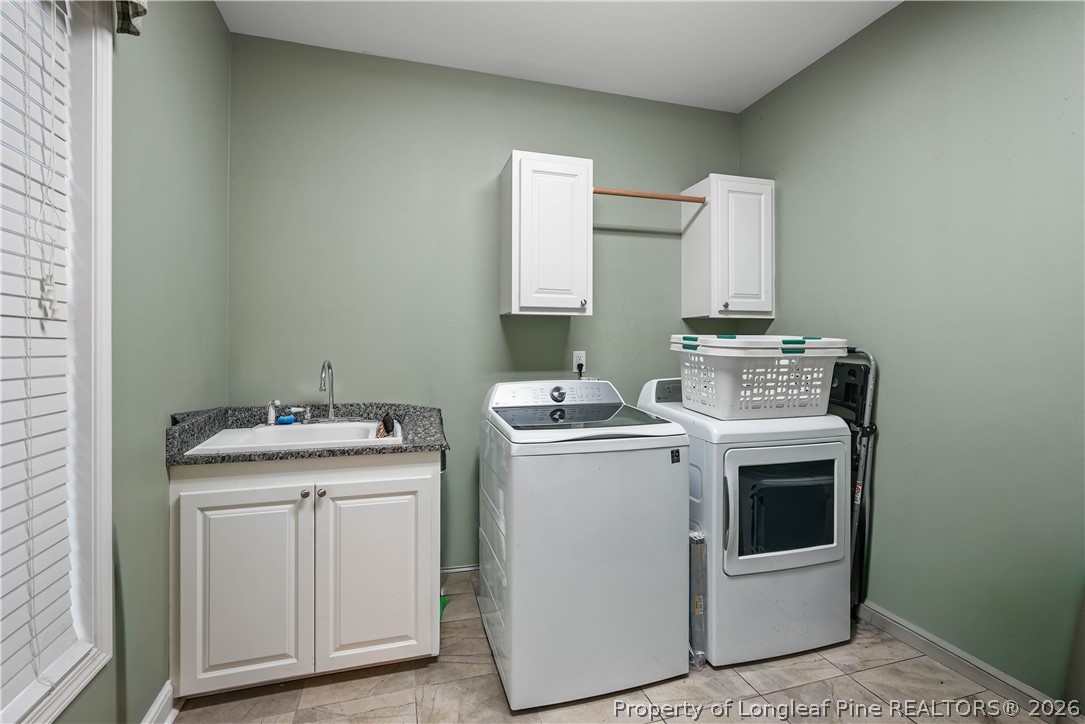 280 Hemp St Extension Robbins, NC 27325 - Photo 20 of 29 a utility room with dryer and washer