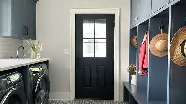 a living room with a bed furniture and a window