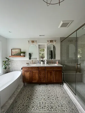 a bathroom with a double vanity sink and a mirror