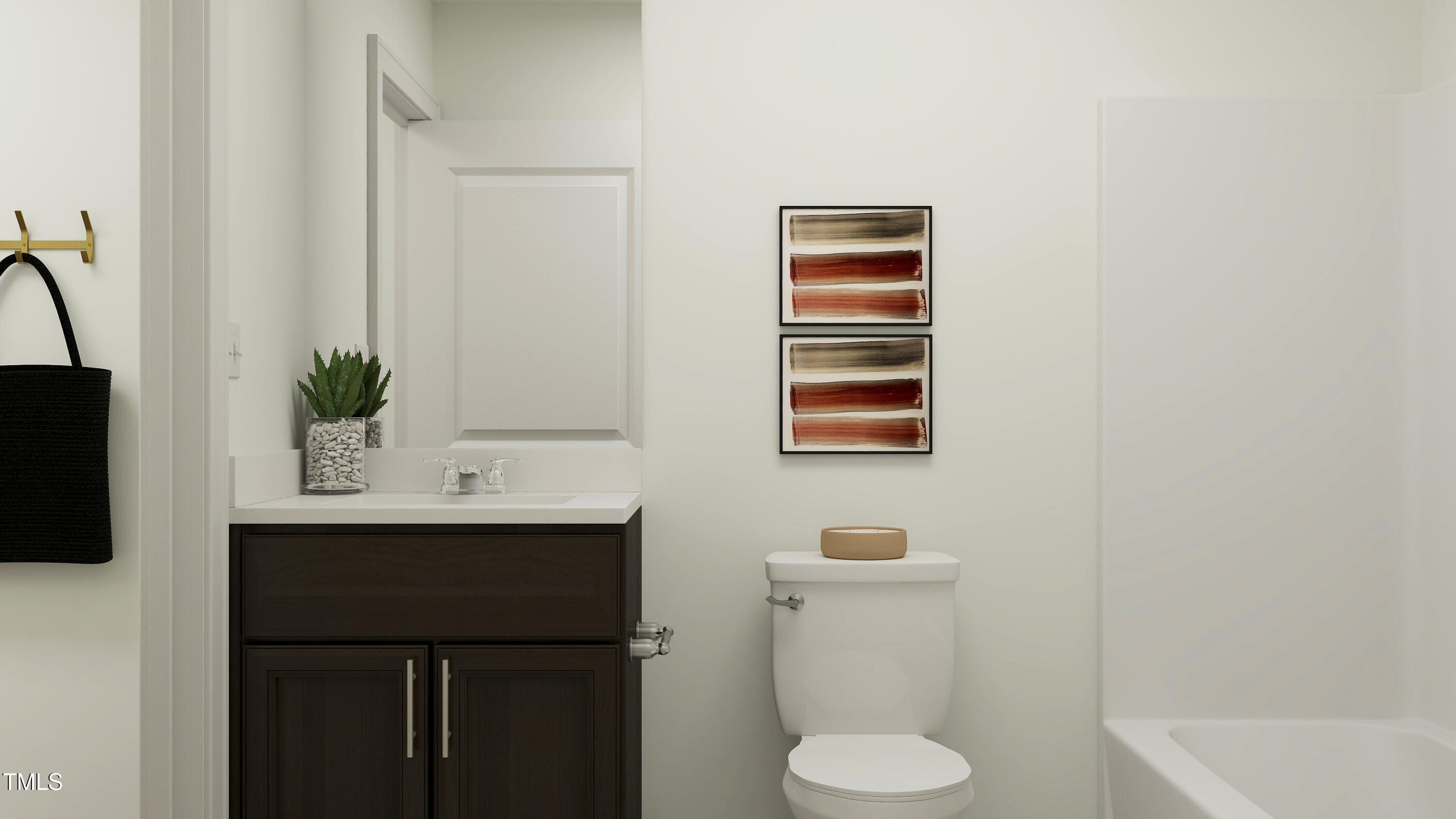 1441 Jay Road Knightdale, NC 27545 - Photo 41 of 57 a bathroom with a sink toilet and mirror