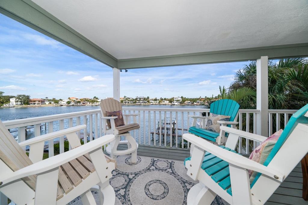 2505 Bay Boulevard, Unit 4 Indian Rocks Beach, FL 33785 - Photo 29 of 63 a view of a balcony with furniture