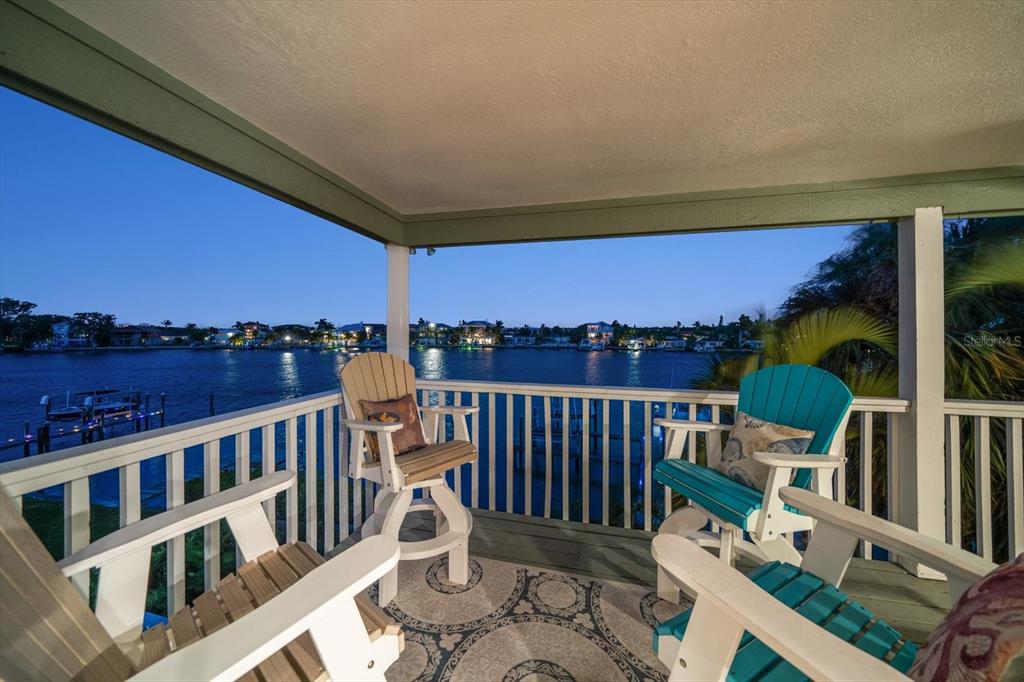 2505 Bay Boulevard, Unit 4 Indian Rocks Beach, FL 33785 - Photo 32 of 63 a view of a chairs and table on the roof deck