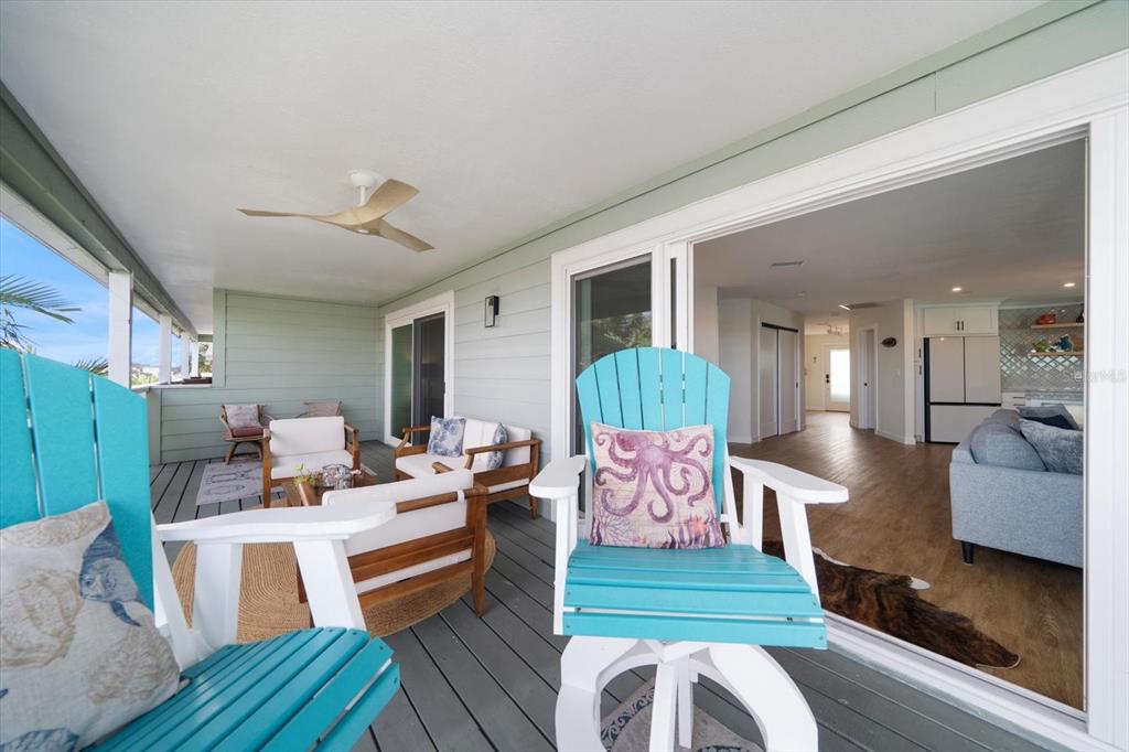2505 Bay Boulevard, Unit 4 Indian Rocks Beach, FL 33785 - Photo 33 of 63 a living room with furniture and a wooden floor