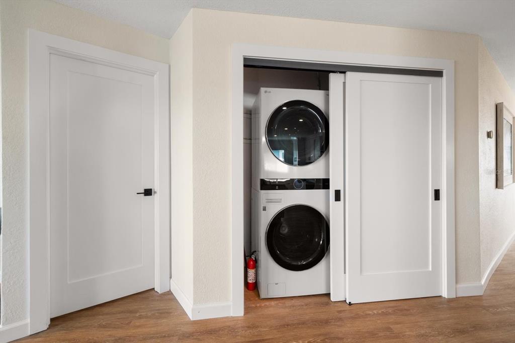 2505 Bay Boulevard, Unit 4 Indian Rocks Beach, FL 33785 - Photo 37 of 63 a view of a hallway with washer and dryer