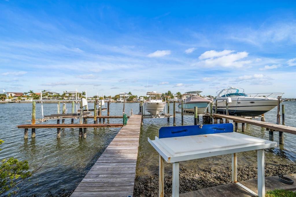 2505 Bay Boulevard, Unit 4 Indian Rocks Beach, FL 33785 - Photo 39 of 63 a view of a terrace with sitting area