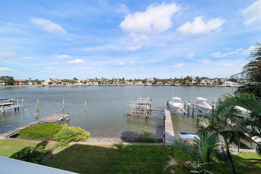 2505 Bay Boulevard, Unit 4 Indian Rocks Beach, FL 33785 - Photo 40 of 63 a view of a lake with houses in the back