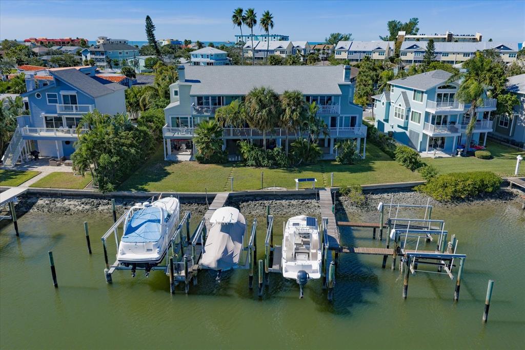 2505 Bay Boulevard, Unit 4 Indian Rocks Beach, FL 33785 - Photo 41 of 63 a view of a chairs and table in patio
