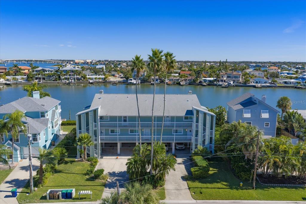 2505 Bay Boulevard, Unit 4 Indian Rocks Beach, FL 33785 - Photo 53 of 63 an aerial view of a house with a lake view