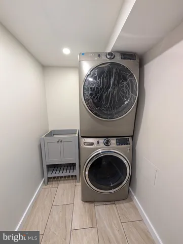 a view of washer and dryer in a utility room