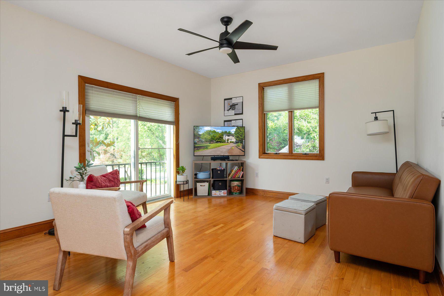 2710 Parkview Drive Riva, MD 21140 - Photo 15 of 60 a living room with furniture and floor to ceiling windows