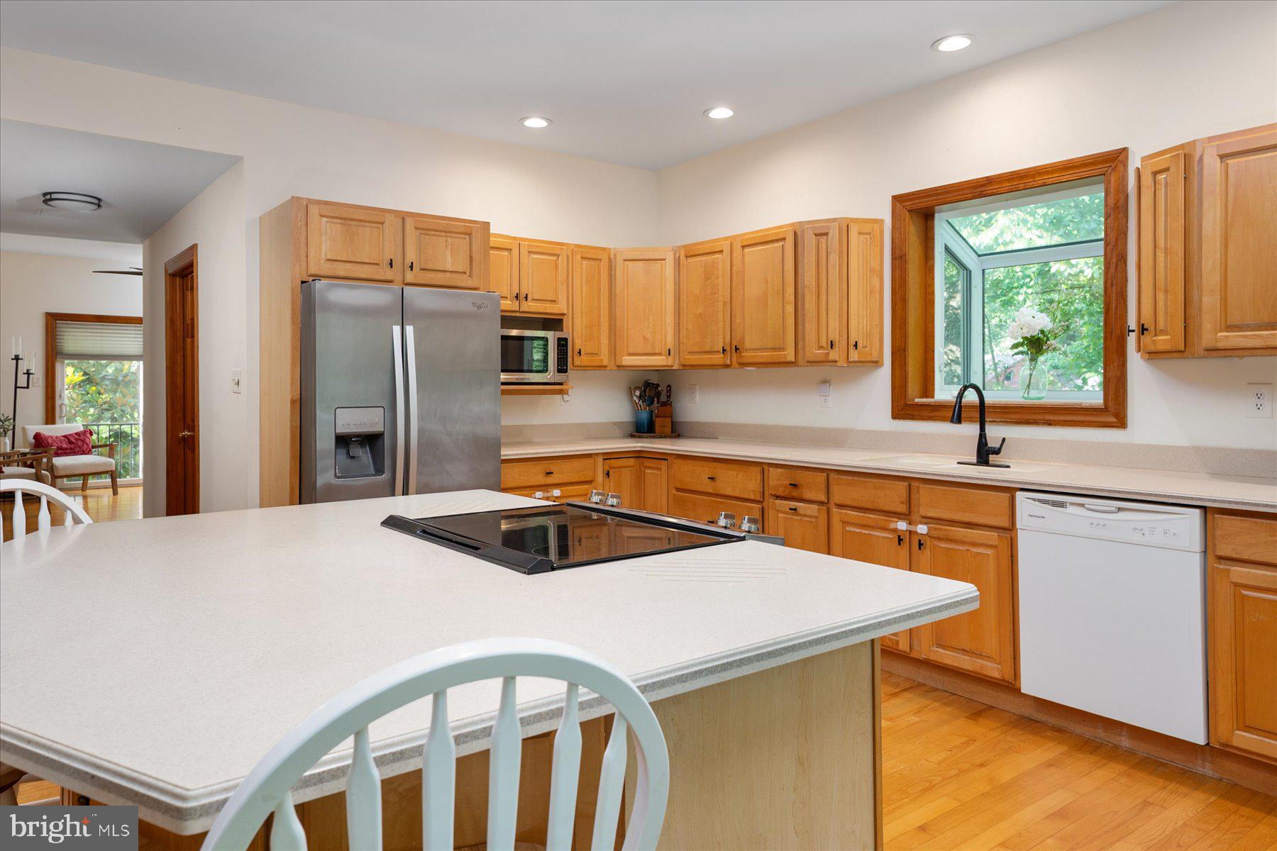 2710 Parkview Drive Riva, MD 21140 - Photo 23 of 60 a kitchen that has a cabinets a sink a stove and a refrigerator