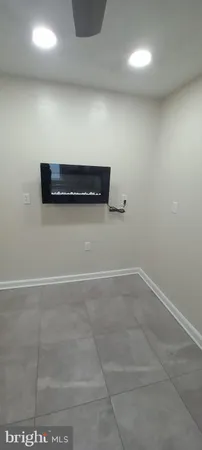 a view of a refrigerator in a room