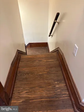 a bathroom with a tub and a shower
