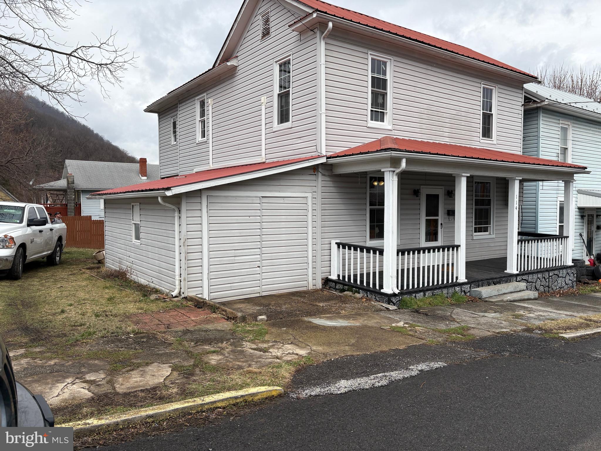 114 D Street Keyser, WV 26726 - Photo 3 of 37 a view of a house with a yard