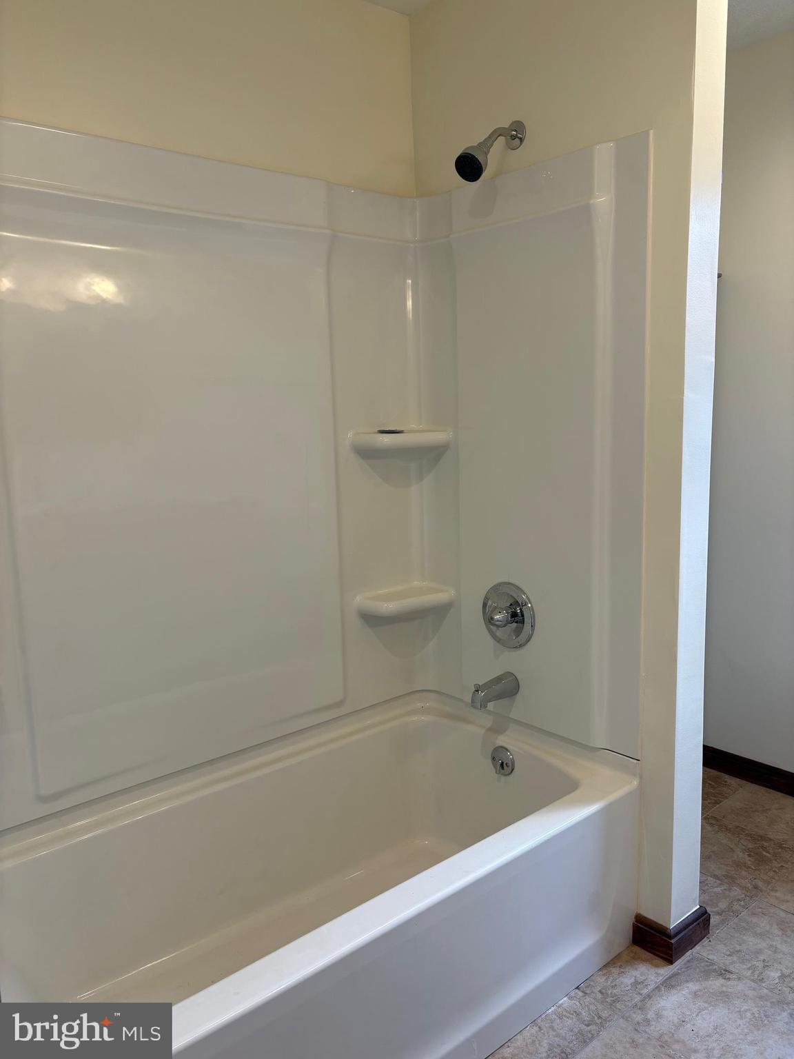 114 D Street Keyser, WV 26726 - Photo 35 of 37 a bathroom with a tub and a shower