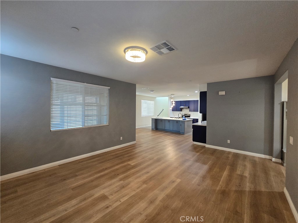220 West Via Rua Flores Ontario, CA 91762 - Photo 13 of 51 a view of a kitchen with a sink and a stove top oven