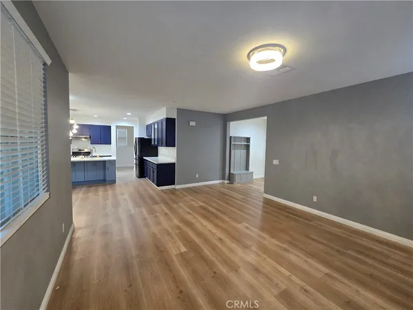 a view of a kitchen and a windows