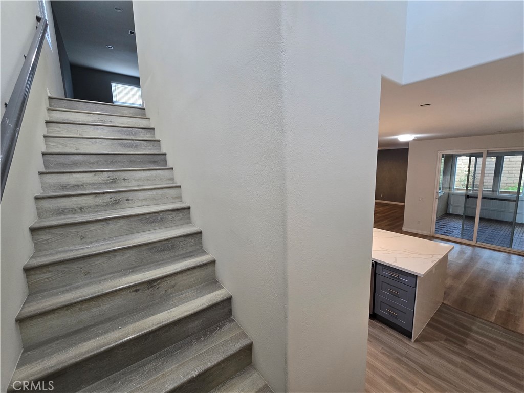 220 West Via Rua Flores Ontario, CA 91762 - Photo 20 of 51 a view of entryway and hall with wooden floor