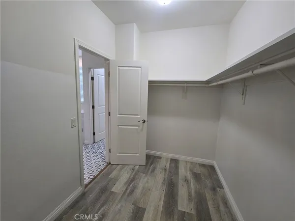 a bathroom with a sink a mirror and a bathtub