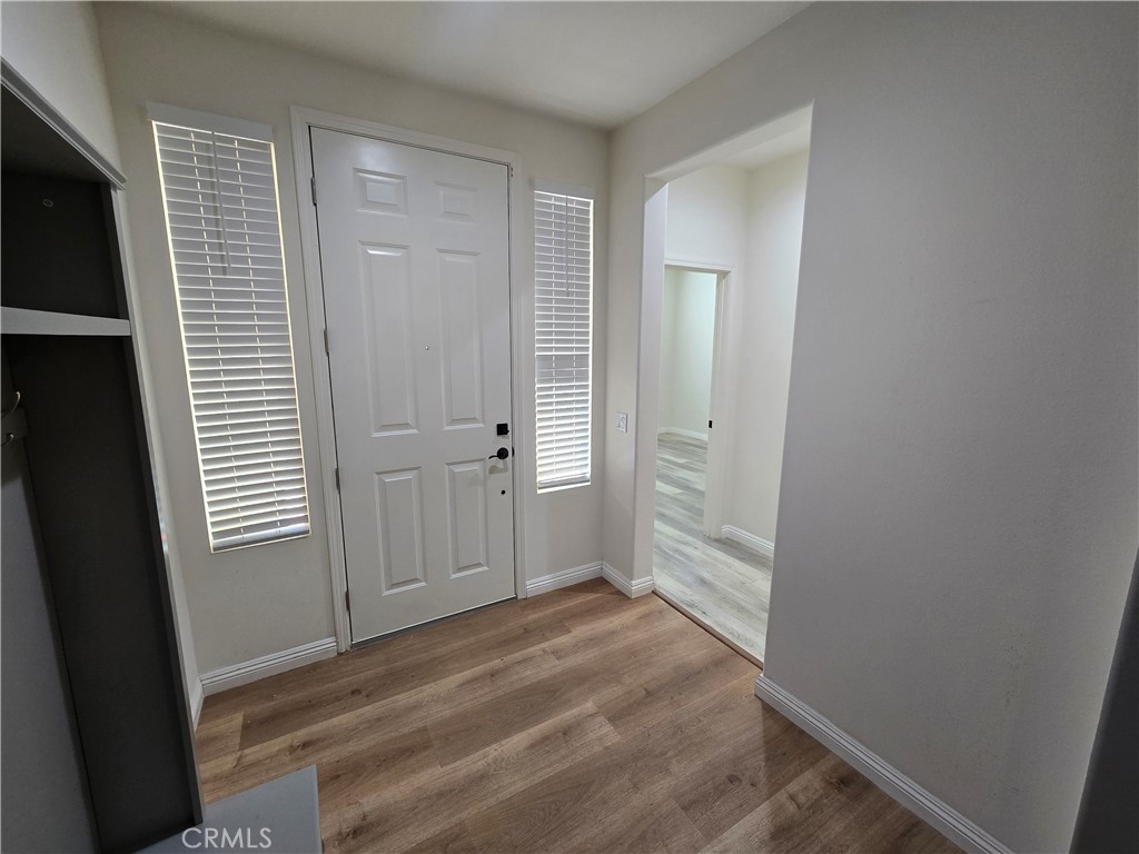 220 West Via Rua Flores Ontario, CA 91762 - Photo 4 of 51 an empty room with windows