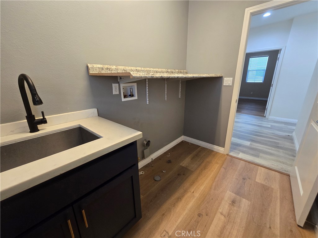 220 West Via Rua Flores Ontario, CA 91762 - Photo 45 of 51 a view of a hardwood floor and a sink