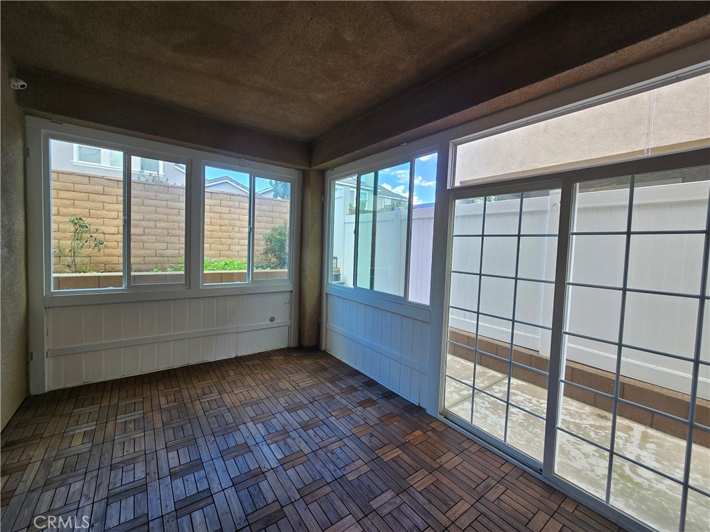 220 West Via Rua Flores Ontario, CA 91762 - Photo 46 of 51 a view of an empty room with wooden floor and a window