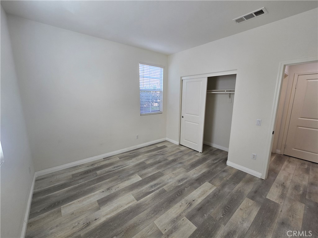 220 West Via Rua Flores Ontario, CA 91762 - Photo 7 of 51 a view of empty room with window