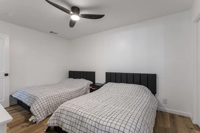 a view of a storage and utility room with washer and dryer
