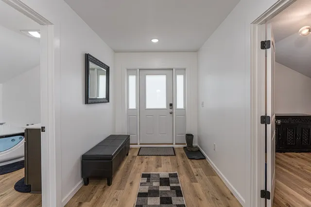 a view of a workspace with furniture