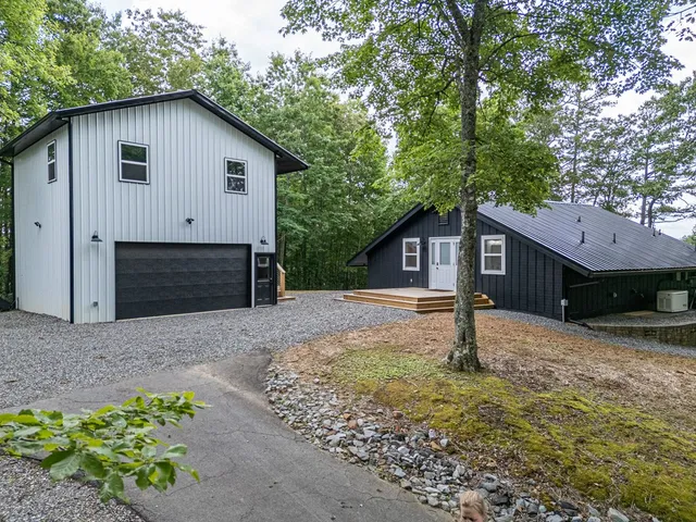 a kitchen with a table and chairs in it