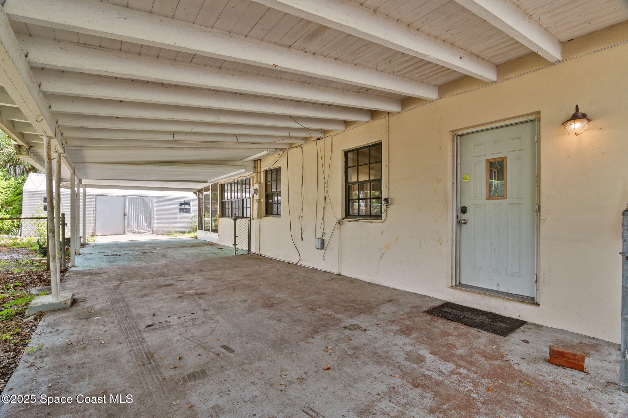 504 Cornell Avenue Melbourne, FL 32901 - Photo 17 of 24 a view of a big room with closet and windows
