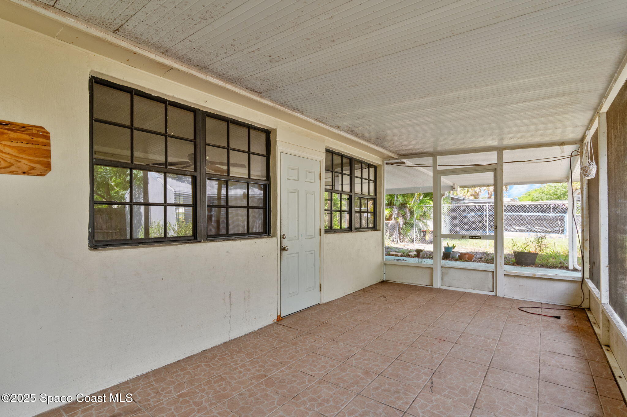 504 Cornell Avenue Melbourne, FL 32901 - Photo 19 of 24 a large white room with a large window