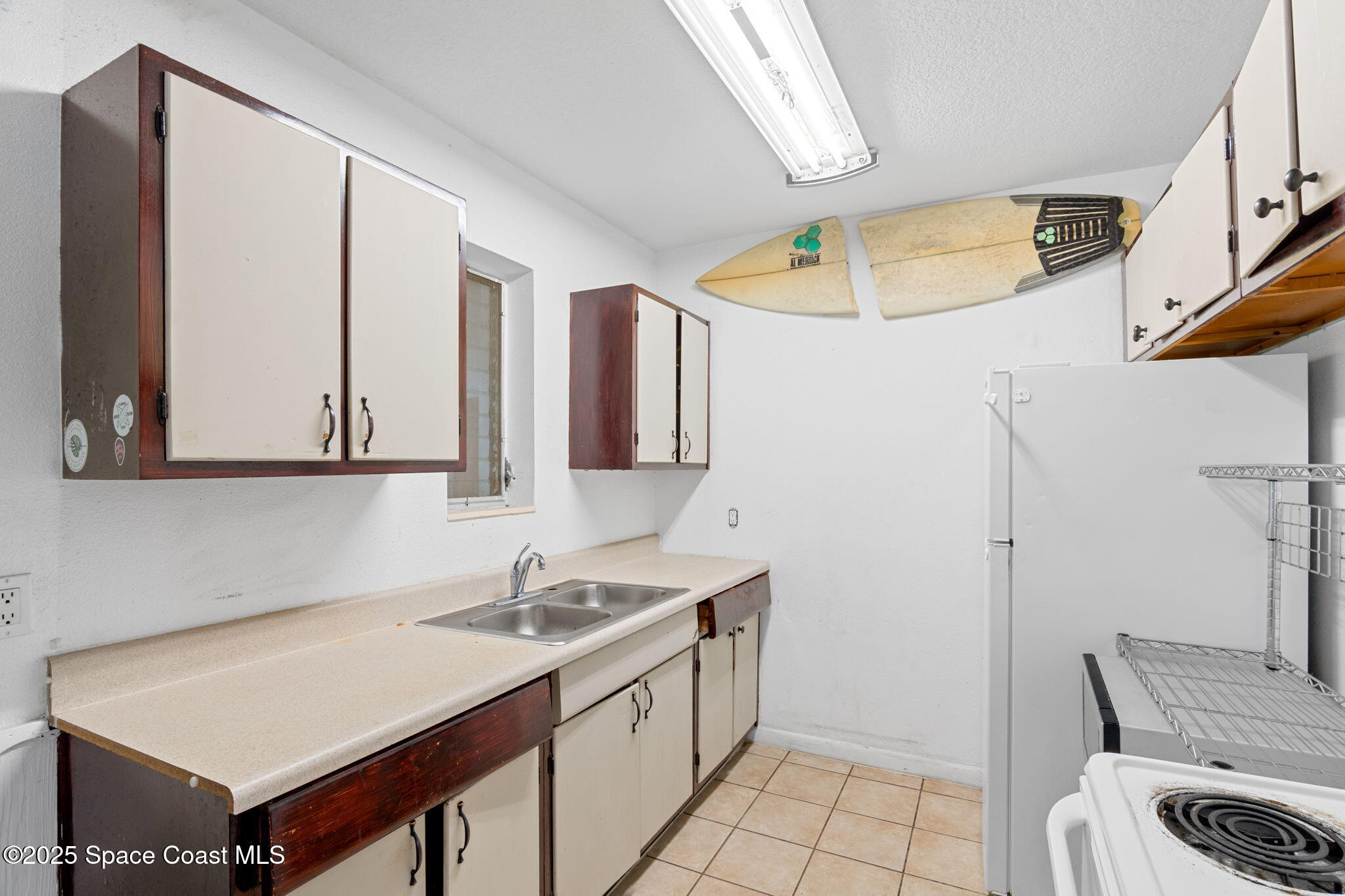 504 Cornell Avenue Melbourne, FL 32901 - Photo 4 of 24 a bathroom with a sink and a mirror