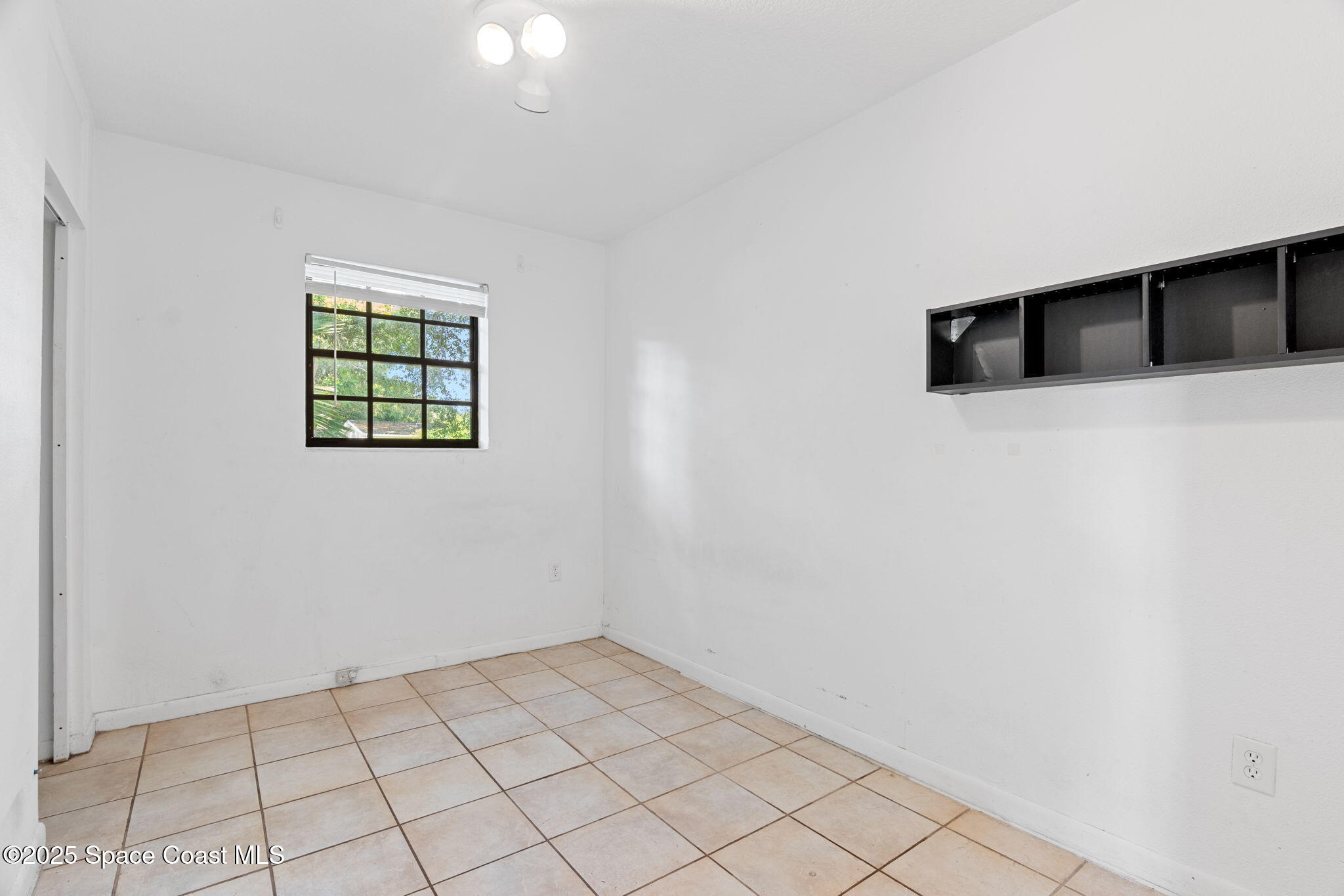 504 Cornell Avenue Melbourne, FL 32901 - Photo 7 of 24 a view of an empty room