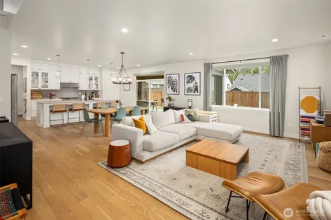 a living room with furniture and a table