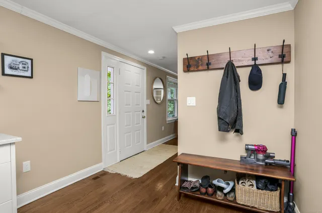 a room with furniture and wooden floor